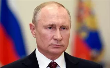 բ