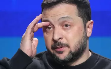 բ