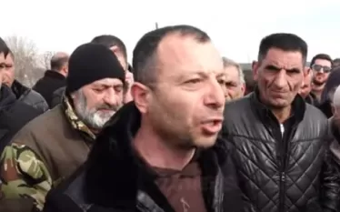 աս