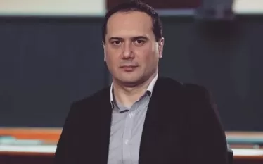 դ