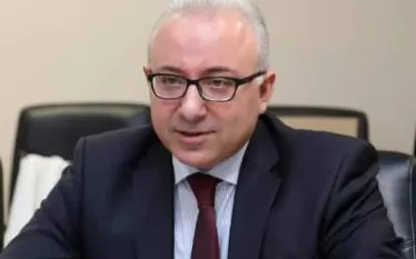 կ
