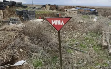 Ական