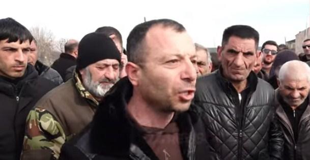 աս